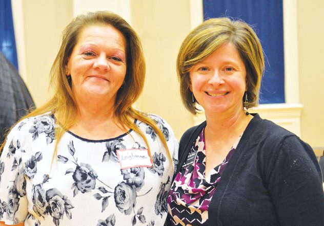 Photo by Nancy Shirley    Dr. Amy Wilson, right, medical director for the Community Care Clinic, helped clinic patient Leighanne Smith, left, in finding a cure for her hepatitis C. Smith spoke Monday at the Community Thanks event.