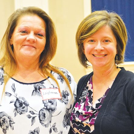 Photo by Nancy Shirley    Dr. Amy Wilson, right, medical director for the Community Care Clinic, helped clinic patient Leighanne Smith, left, in finding a cure for her hepatitis C. Smith spoke Monday at the Community Thanks event.